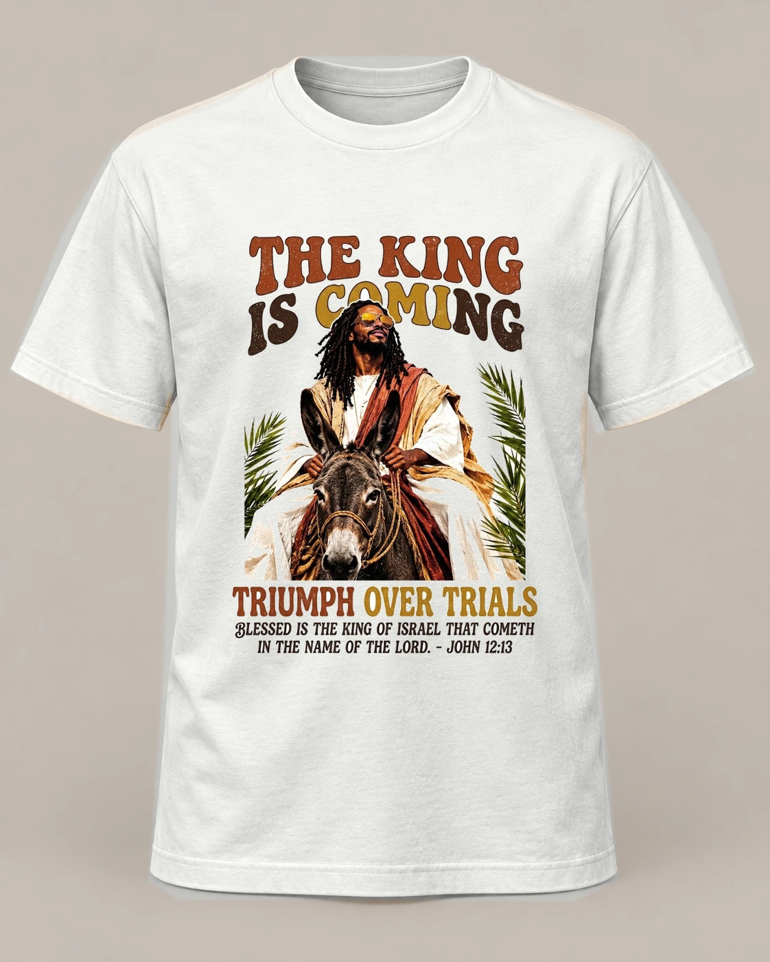 The King Is Coming, White crew concept, front — AI garment preview; placement and color may vary. Not a production proof.